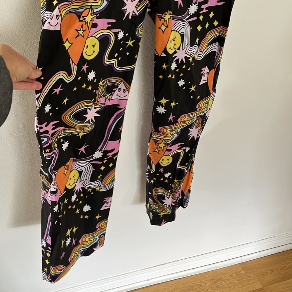 Women’s Black Graphic Jumpsuit with Colorful Cosmic Print - Picture 3 of 5